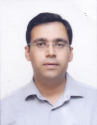 Shri Ravi Dhawan