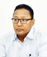 Shri Shamsheer Singh Rawat